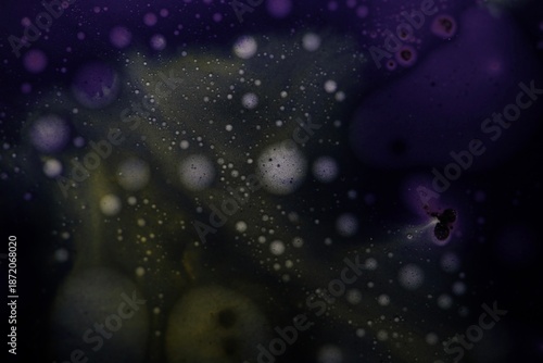 Dark liquid surface, oil stains, bright chemistry, surreal background, water surface, ink and water