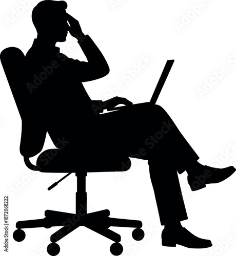 Man stressed while working on laptop