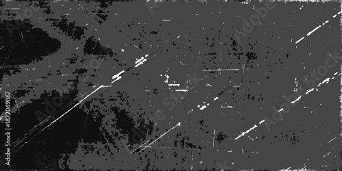 Abstract monochrome texture with scattered lines and dark grainy background