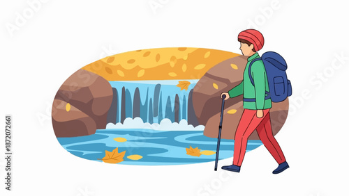 A person with a backpack and walking stick hikes near a waterfall in an autumnal landscape