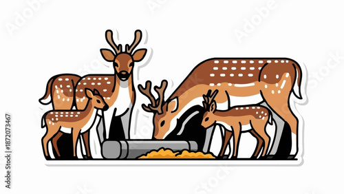 A herd of deer with spotted coats drinks from a trough filled with grain