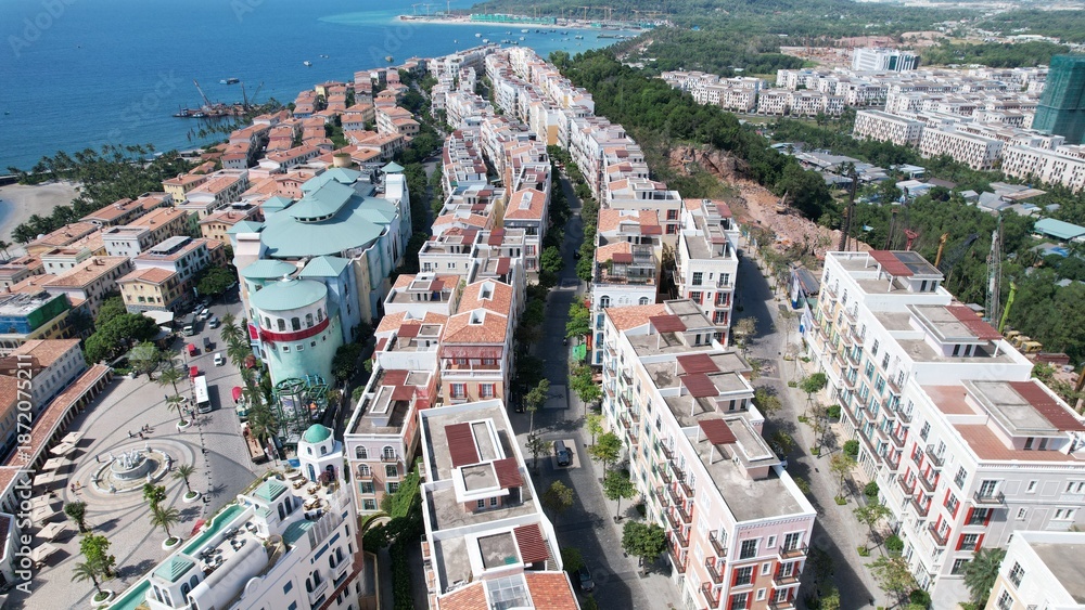 custom made wallpaper toronto digitalPhu Quoc, Sunset Town, Vietnam. 4k high-quality footage taken with a Drone showcasing colorful buildings, blue skies, a watch tower, a kissing bridge, turquoise clear waters, green forest, golden sand