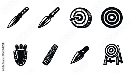 Set of black and white throwing knives and targets on dark background