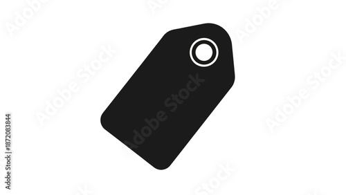 A black tag with a circular hole is tilted on a white background
