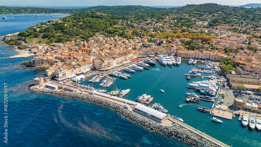 Fototapeta premium Aerial view of Saint-Tropez in summer, a famous tourist destination on the Cote d'Azur, France.