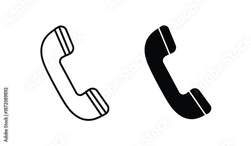 Two black and white phone handset icons on a pure for communication and contact concepts