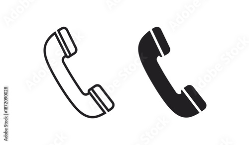 Two black and white telephone handset icons on a pure for communication and contact concepts