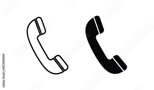 Two black and white telephone handset icons on a plain for communication or business concepts