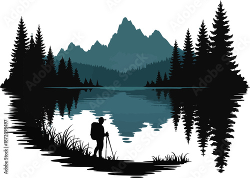Hiker Standing By Mountain Lake