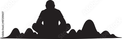 Silhouette of a person meditating on a mountain