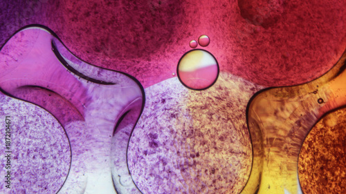 A colorful background with many small drops of water