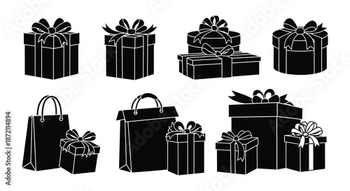 Collection of black gift boxes with ribbons and bows isolated on white
