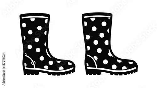 Pair of black polka dot wellington boots a charming silhouette