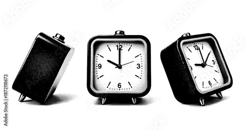 Retro black and white alarm clocks with bold dots in variety of angles