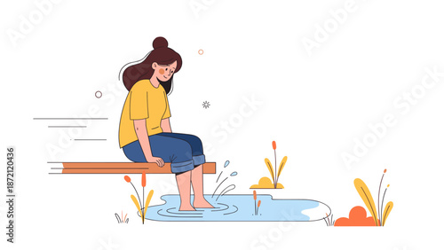 Young caucasian female sitting by pond with feet in water in autumn scene