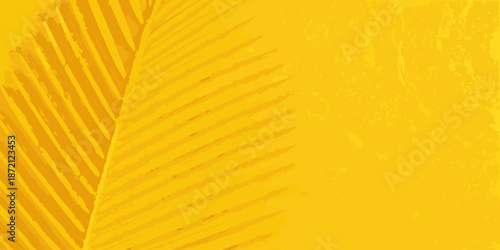 Golden tropical leaves create a vibrant and textured background pattern