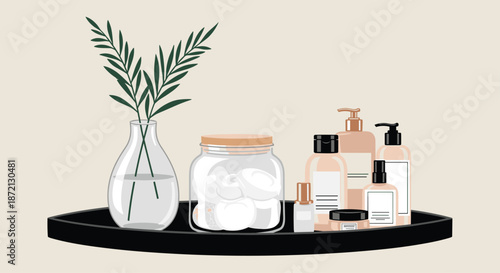 Collection of neutral-toned cosmetic bottles and jars arranged on a black tray with a vase of green leaves nearby.