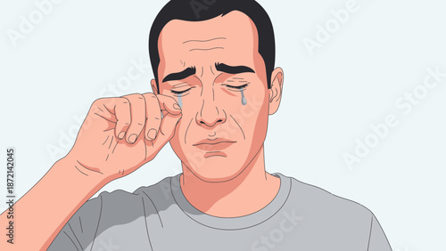 Man Crying and Wiping Tears from His Eyes with Hand.