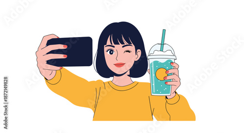 Happy young woman with short hair winking and taking a selfie while holding a colorful refreshing summer drink.