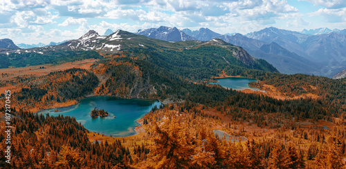 Fototapeta Sunshine Meadows lakes in Banff mountains during bright summer day with clear sk