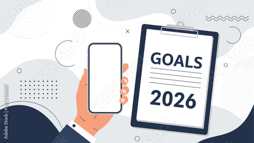 Hand holding a smartphone with a blank screen next to a clipboard with 'GOALS 2026' on it, over a modern gray and white abstract background with shapes.
