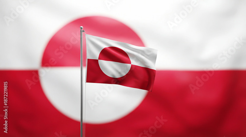 Flag of Greenland with a same larger, blurred flag in the background, waving in the wind