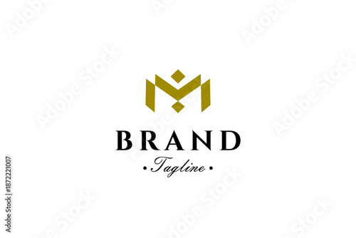 Luxurious gold letter M logo in flat vector design style