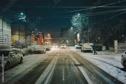 The streets of the city of Cacak while the first snow falls