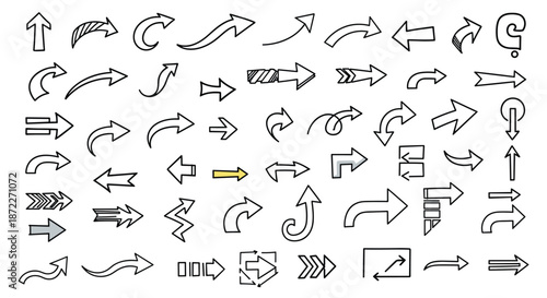 Large collection of diverse hand-drawn black arrow sketches pointing in various directions with one single yellow arrow highlight on white background.