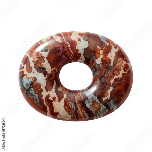Colorful Stone Object With a Hole in the Center Placed on a Light Background