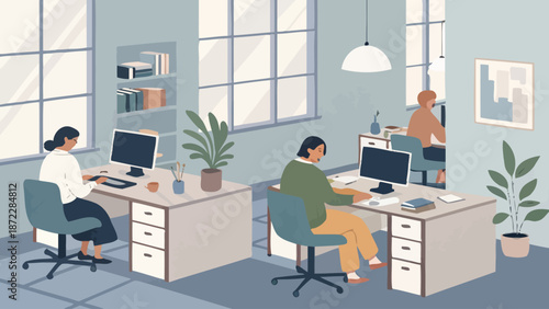 Modern office with coworkers working diligently at desks