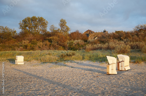 A few beach chairs alone on the beach on the Darß Peninsula, Germany