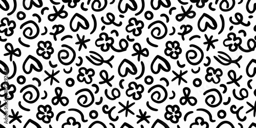 Intricate black and white pattern of whimsical doodles and playful symbols