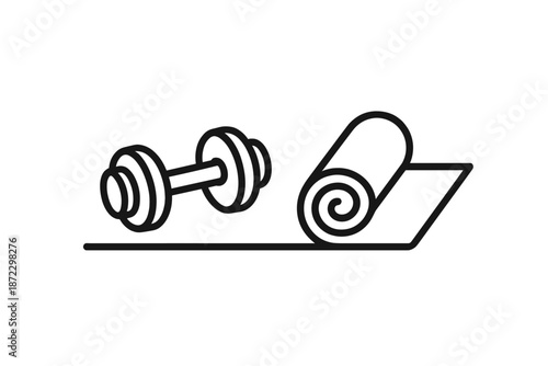 Dumbbell and yoga mat on the floor in a room for exercise and fitness activity