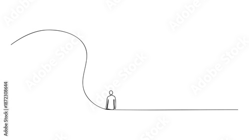 A lone figure standing at the edge of a winding path