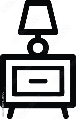 Simple black and white line drawing of a bedside table with a lamp
