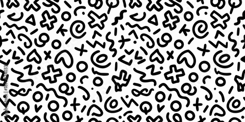Abstract black and white pattern featuring chaotic scribbled symbols and shapes
