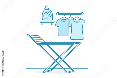 Clothes drying setup with detergent and shirts hanging on rack at home