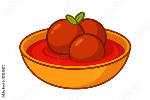 Bowl of meatballs in red sauce served with fresh herbs on top at a dinner setting
