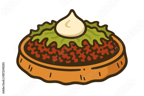 Dish with layers of green and brown topped with a dollop of white cream served on a flat surface in a simple setting
