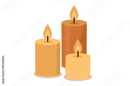 Candle arrangement with three different sizes lit in a simple setting during evening hours