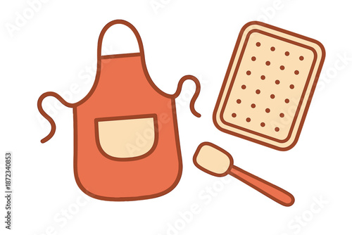Colorful apron, baking tray, and spatula set for kitchen activities during cooking and baking sessions at home