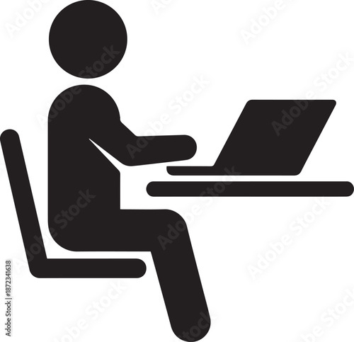 man working on laptop in office