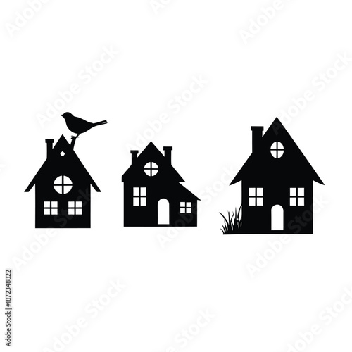 Black silhouettes of three houses with a bird on one roof on easter day