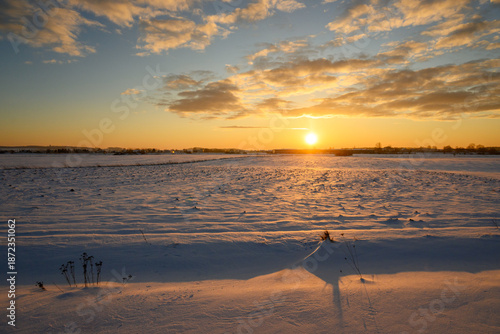 Snow covered field. Winter landscape in northern Poland. Europe