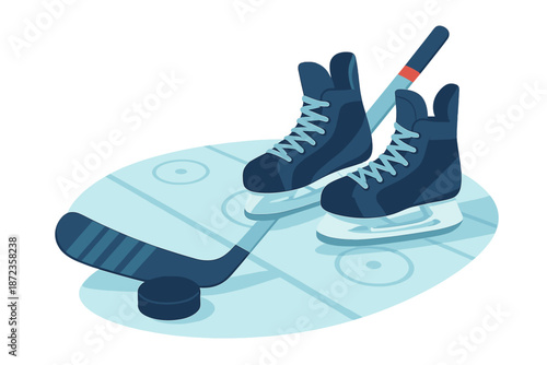 Hockey skates and stick on ice rink during afternoon practice session
