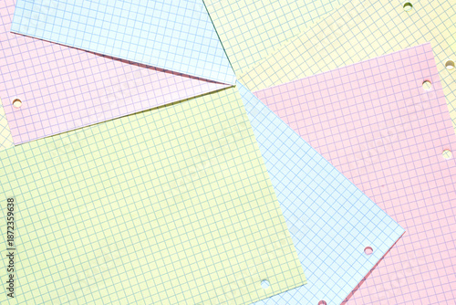 Photos Colorful quadrille paper sheets in pastel tones with overlapping design for creative craft projects