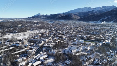 Zakopane Polish town winter mountains aerial drone views blue skies snow