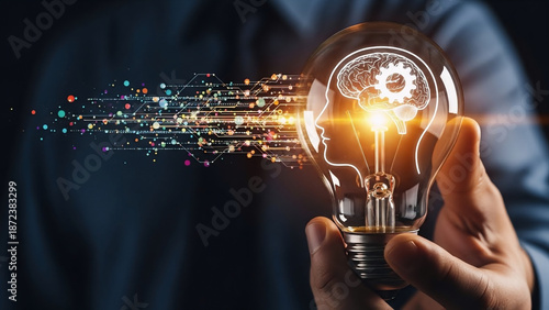Illuminated light bulb with brain and data stream for ai and innovation concept
