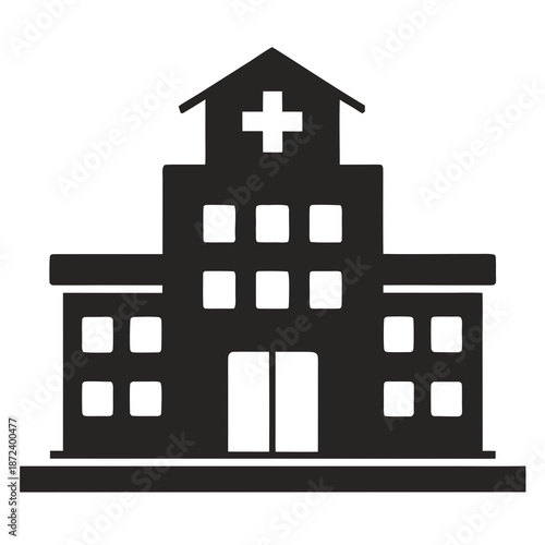 Title: Black and white of a hospital building with a cross on the roof clean